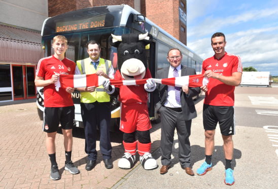 From left, Dean Campbell, John Gillies (First driver), Angus, Graeme Macfarlan (commercial director Scotland First Bus), Andrew Considine.
Picture by Scott Baxter