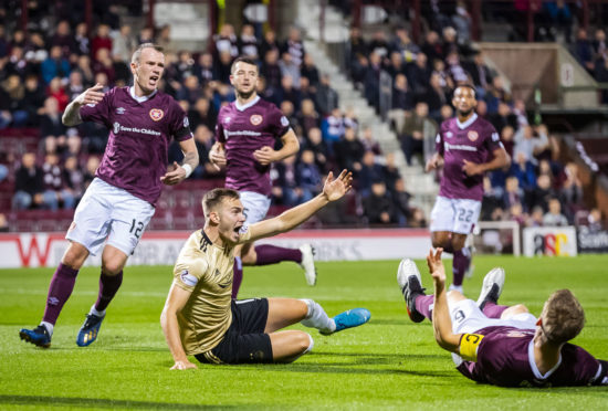 Aberdeen exited the League Cup at Tynecastle.