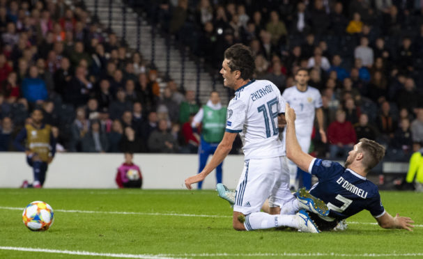 Yuri Zhirkov puts Russia 2-1 up against Scotland at Hampden, beating Stephen O'Donnell to a cross