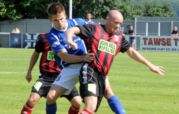 Andy Low, right, was a player for Locos and is now interested in the top job.