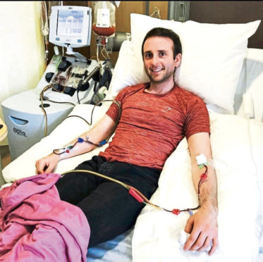 Paul giving his donation
