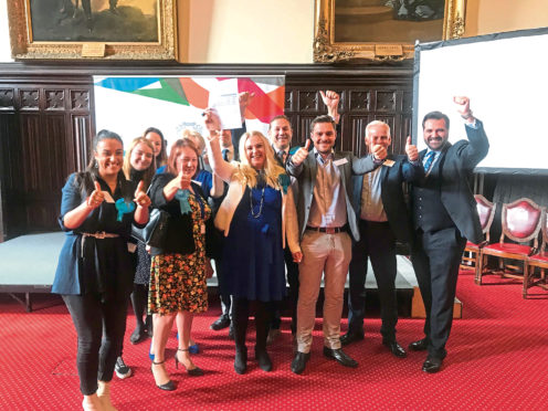 Scottish Conservative activists celebrating after the success of Sarah Cross (Centre) in the Bridge of Don by-election.