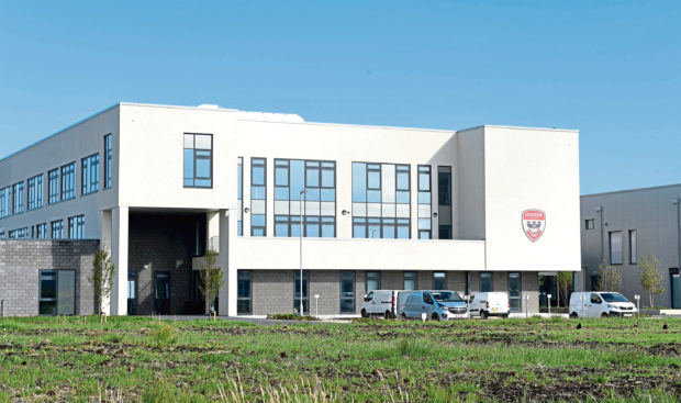 The parking area outside reception is for blue badge holders only
