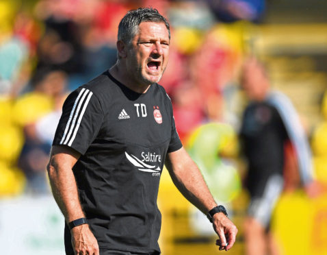 Aberdeen assistant Tony Docherty.