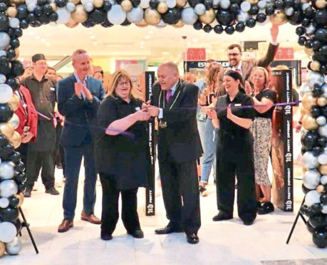 Catherine Leaper and Lord Provost Barney Crockett cut the ribbon to celebrate
