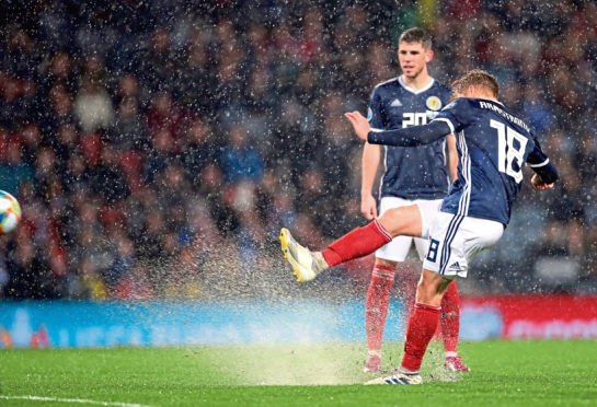 Scotland's Stuart Armstrong scores his sides sixth goal during the UEFA Euro 2020 qualifying match at Hampden Park, Glasgow. PA Photo. Picture date: Sunday October 13, 2019. See PA story SOCCER Scotland. Photo credit should read: Steve Welsh/PA Wire. RESTRICTIONS: Use subject to restrictions. Editorial use only. Commercial use only with prior written consent of the Scottish FA. Call +44 (0)1158 447447 for further information.