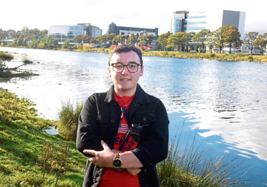 Austin Munro is encouraging businesses to offer people the chance to refill water bottles Picture by Jim Irvine