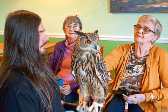 Handler William Lawson and one of his beautiful owls meets Hazel Middler and Betty Watson at the home