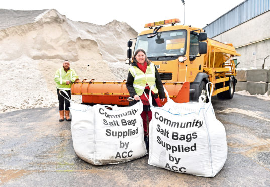 Councillor Sandra Macdonald and roads supervisor Steve Milne
