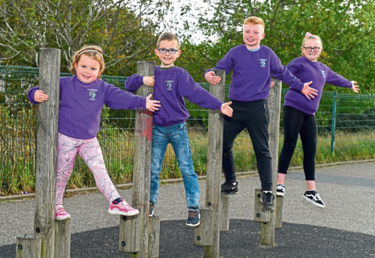 Rhea Petrie, 5, Cameron Kessack, 7, Harry Hepburn, 10, Dania Ross, 11 of Glashieburn School. Picture by Kenny Elrick.