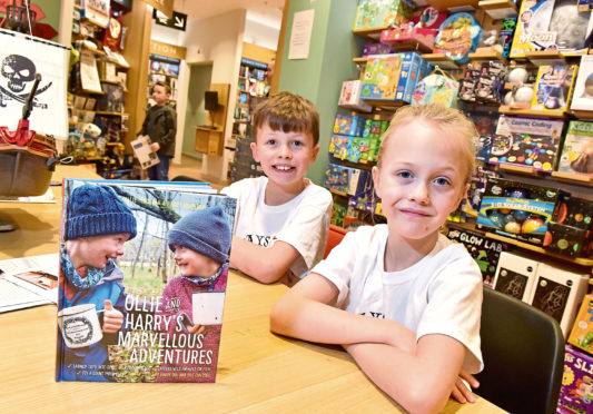 Ollie and Harry Ferguson at their book signing at Waterstones Aberdeen. Picture by Scott Baxter