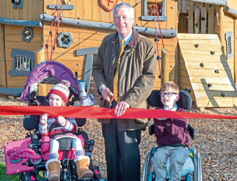 Aberdeenshire provost Bill Howatson does the honours at the new play park