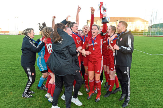 Aberdeen Women being presented with the SWFL Division One North trophy.