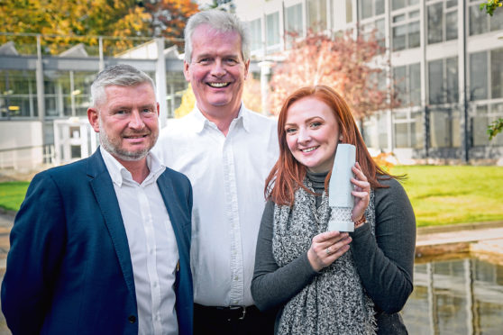 Pete Baker from TAQA and Ian Phillips from SPE with winner Rachel Mackay