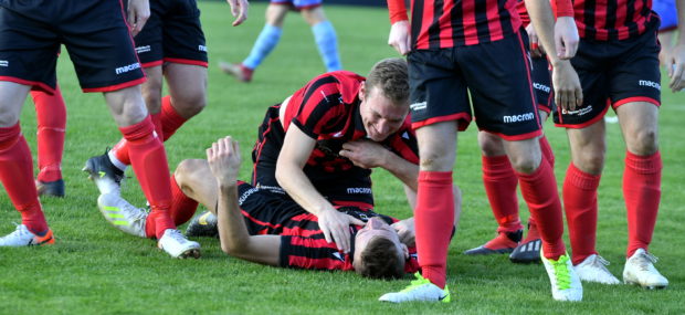 Mark Souter celebrates scoring with Eric Watson.
Pic by Chris Sumner