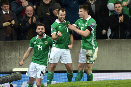 McGinn is away with Northern Ireland.