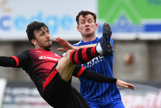 Paddy Boyle, right, in action against Airdrieonians.