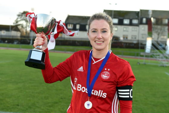 Kelly Forrest with the SWFL Division One North trophy.
Picture by Kenny Elrick