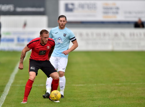 Jonny Smith (red) and Bryan Hay