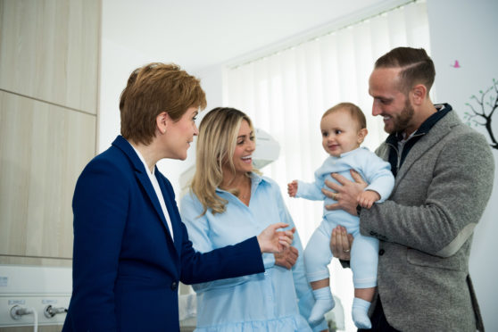 First Minister meeting the first baby born in the new maternity ward, from left is Nicola Sturgeon, Cruz Smith and his parents Yolanda and Jonn Smith.