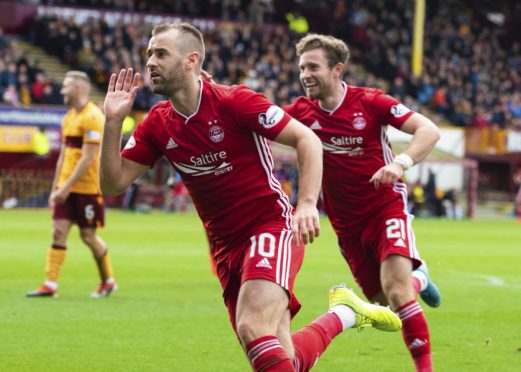 Niall McGinn celebrates scoring Aberdeen's second goal