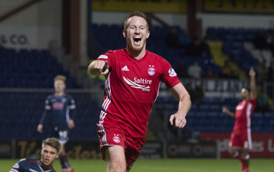 31/01/2018 Adam Rooney scores the Dons third in a 4-2 win in Dingwall 31/01/2018 Adam Rooney scores the Dons third in a 4-2 win in Dingwall