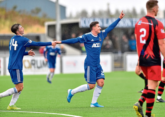 Fraser Aird in action for Cove.