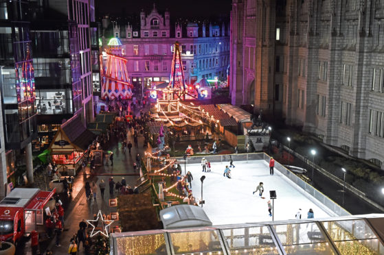 A view of the Christmas Village and ice rink on Broad Street. Picture by Kenny Elrick