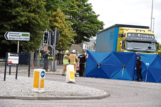Emergency services at the scene of the accident at the St Machar Drive junction, King Street, Aberdeen, where 83-year-old Mary Allan died
