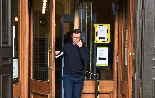 Daniel Higginson leaves Aberdeen Sheriff Court where he appeared for failing to notify police of his new address