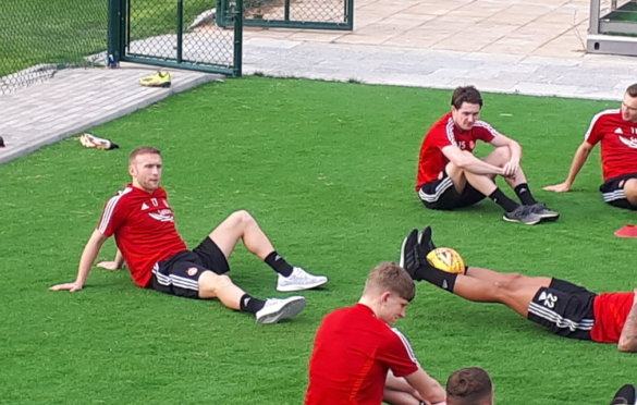Dylan McGeouch, left, with his Aberdeen team-mates in Dubai.