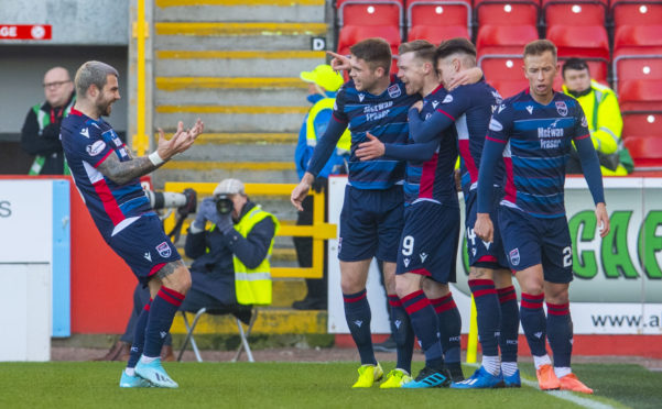 Billy Mckay celebrates his first goal.