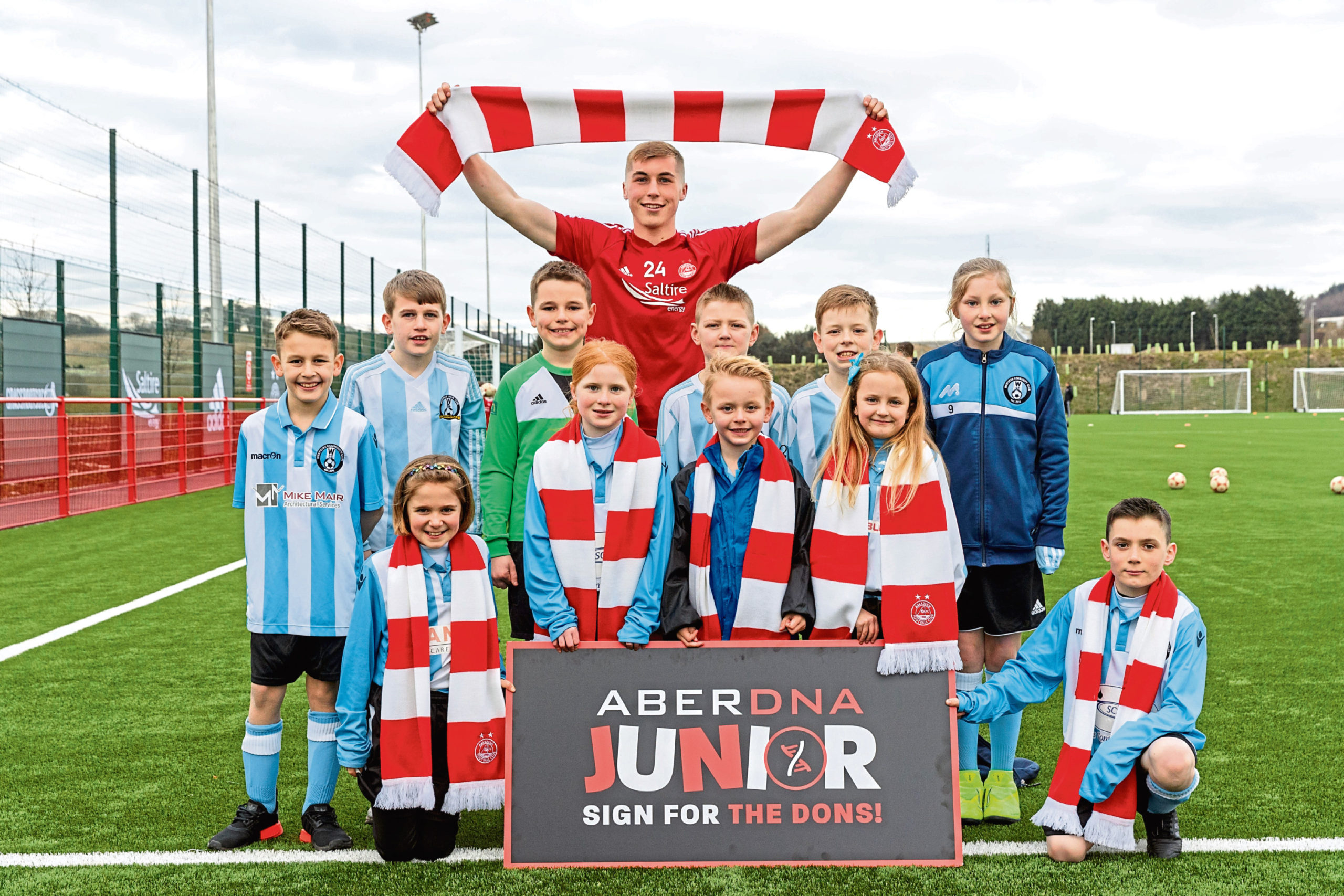 Dean Campbell launches the AberDNA Junior campaign with a little help from some young Dons in the city.