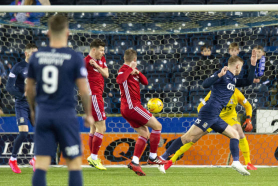Aberdeen’s Niall McGinn (centre) pulls a goal back to make it 2-1 during the Premiership match between Kilmarnock and Aberdeen at Rugby Park.