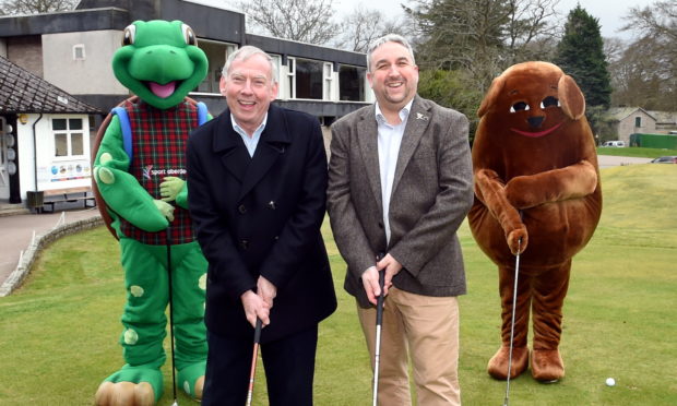 The Active Aberdeen Partnership's Tony Dawson, left, and the ARCHIE Foundation's David Downie, with the Sport Aberdeen and ARCHIE Foundation mascots when the event was announced.
Picture by Jim Irvine