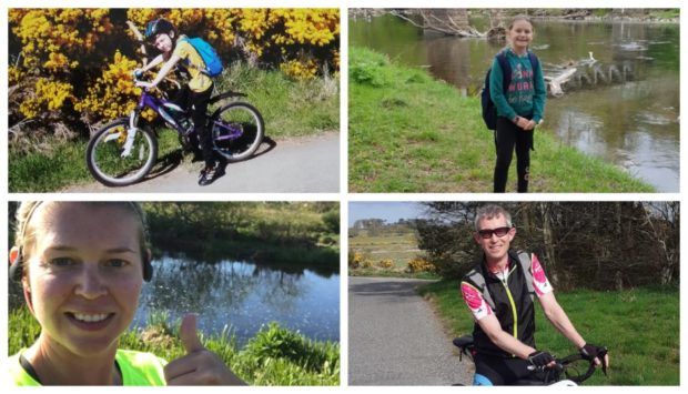Primary three pupil Abigail Adie, head teacher Mark Evans, PE teacher Kat Paul-Bird and Jakub Baranski in primary four