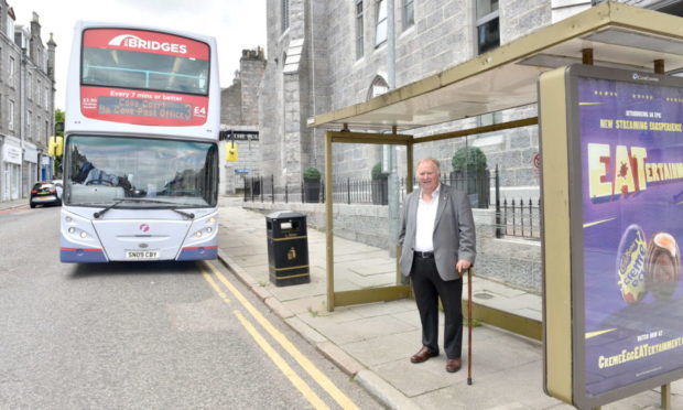 Bill Cormie at the bus stop in Rosemount Place