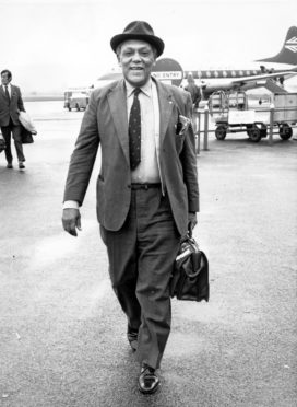 Former Aberdeenshire cricket professional Alma Hunt pictured on his arrival at Aberdeen Airport on 1 August 1973.