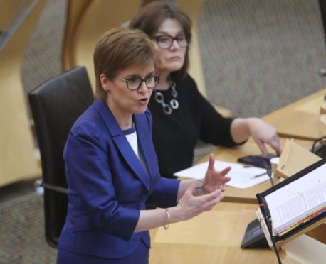 Nicola Sturgeon takes questions at Holyrood.