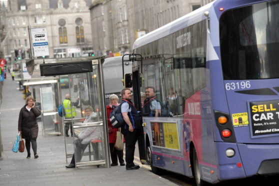 A bus picks up passengers on Union Street. Picture by Kath Flannery