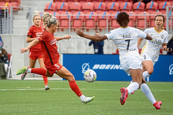 Photo by Rick Bowmer/AP/Shutterstock (10697074c)
Houston Dash forward Rachel Daly (3) scores past Utah Royals FC defender Elizabeth Ball (7) during the first half of an NWSL Challenge Cup soccer match at Zions Bank Stadium, in Herriman, Utah.