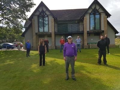 From left, Eddie Roberston, Andrea Stewart (stewardess), Wayne Gibson, Jeff Field, Gordon Graham (captain), Harry Dickie, Matty Smith (head greenkeeper) and Brian Burges.