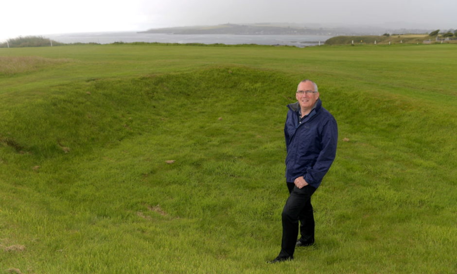 Locator of Club manager Stewart Kerr standing in Hitler's Bunker, the remnants of a crater left by a World War 2 bomb between the first and second fairways of the course. Picture by Kath Flannery
