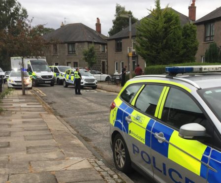 The police presence at Ruthrieston Circle, Aberdeen.
Courtesy Gregor McAbery