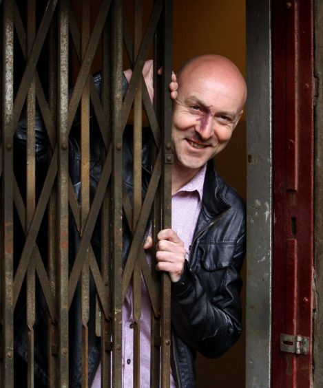The best selling author Christopher Brookmyre appeared in front of MSPs