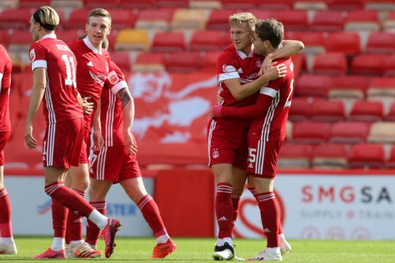 Ross McCrorie celebrates his goal for Aberdeen against Kilmarnock with Scott Wright.