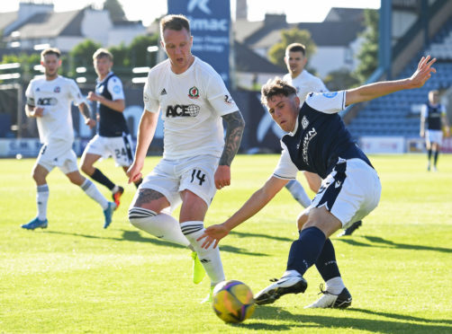 Josh Mulligan, right, playing for Dundee during pre-season