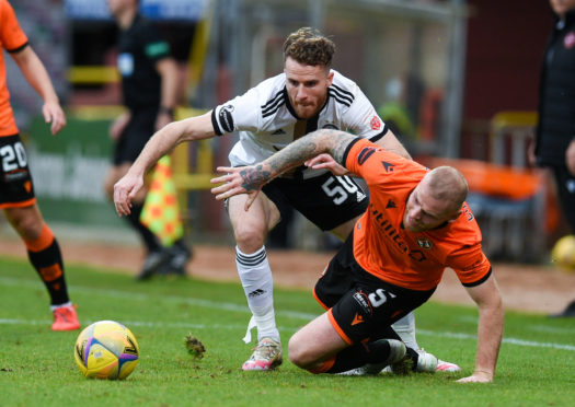 Aberdeen's Marley Watkins, left, and Dundee United's Mark Connolly.