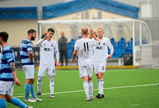 Cove's Jordon Brown celebrating after scoring a goal to make it 1-0 against Banks o' Dee.
Picture by Darrell Benns
