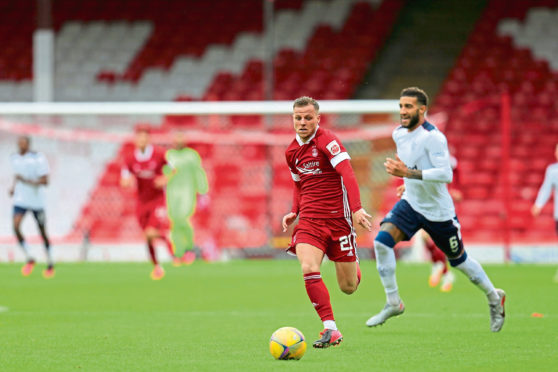 Bruce Anderson playing for the Aberdeen first team in the Premiership opener against Rangers.